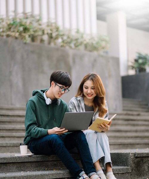 two-smart-young-asian-college-students-focusing-on-S7PPAGC.jpg